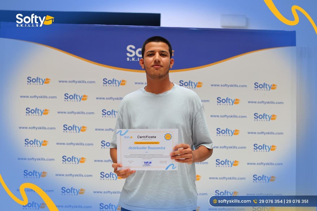 Abdelkader with his trainer certificate