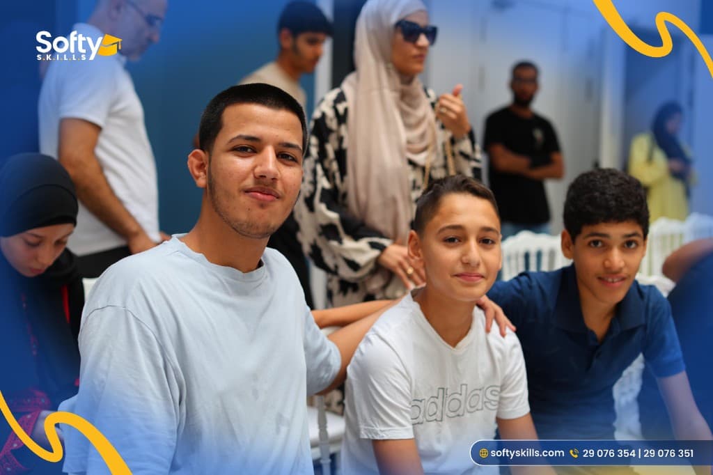 Abdelkader with students at the graduation event